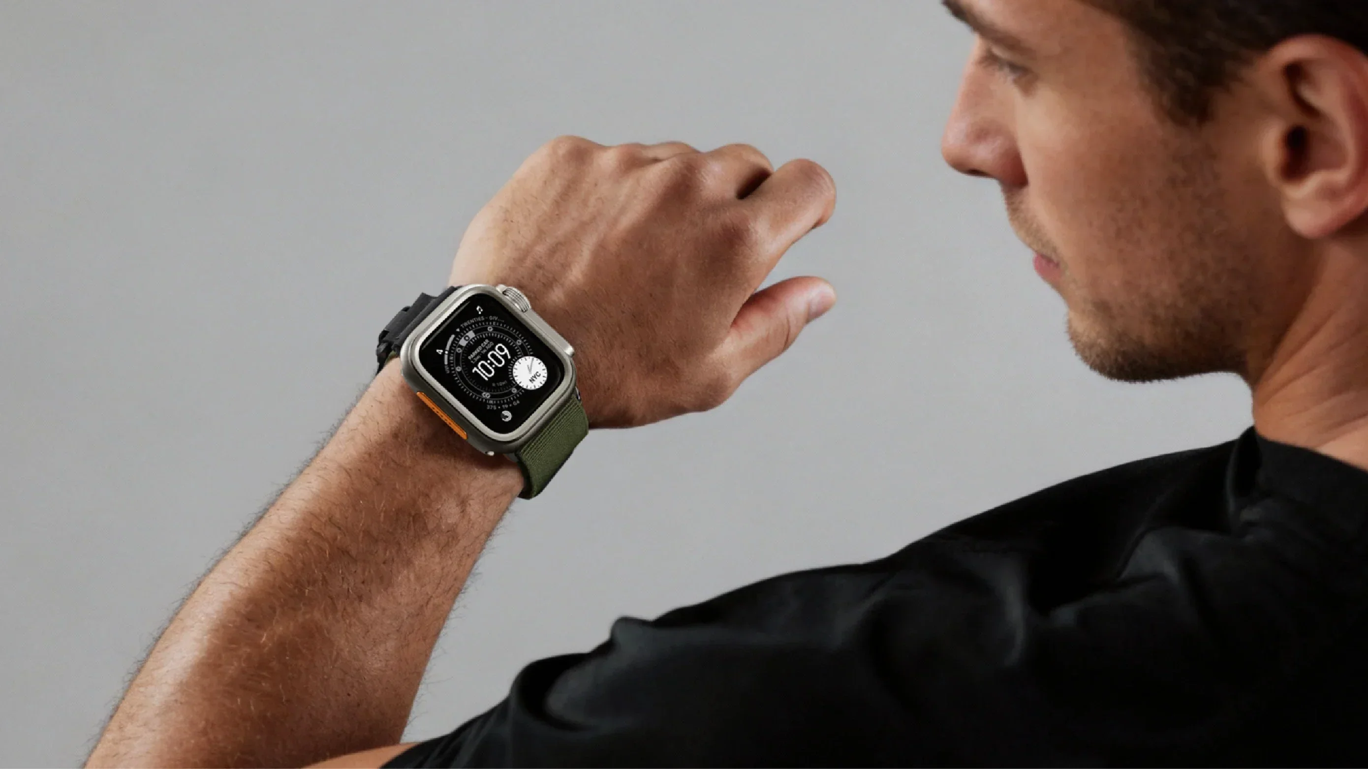 Man wearing an Apple Watch with Bandletic protective case for everyday style and scratch protection.